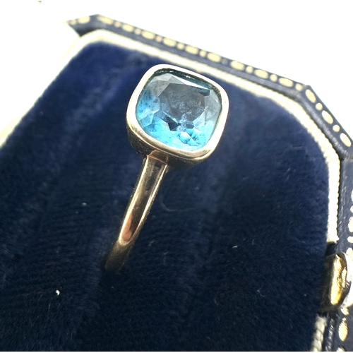 103 - 9ct gold blue topaz ring weight 1.9g