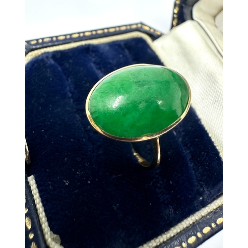 111 - 18ct gold jade ring weight 3.6g