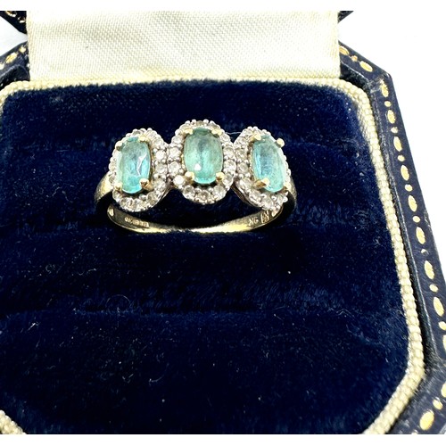 146 - 9ct gold blue gemstone & diamond ring (2g)