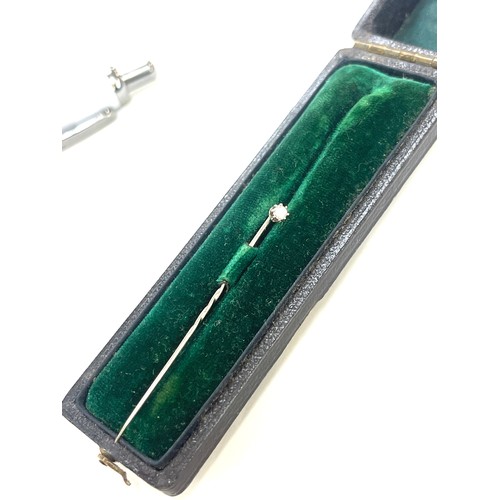 577 - 15ct gold stick pin with diamond , boxed total weight 0.6 grams