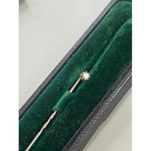 577 - 15ct gold stick pin with diamond , boxed total weight 0.6 grams