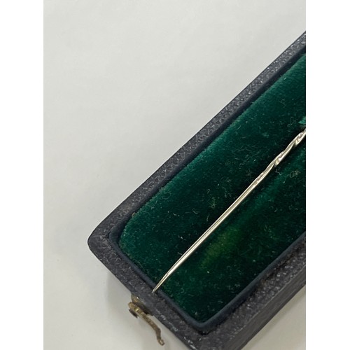 577 - 15ct gold stick pin with diamond , boxed total weight 0.6 grams