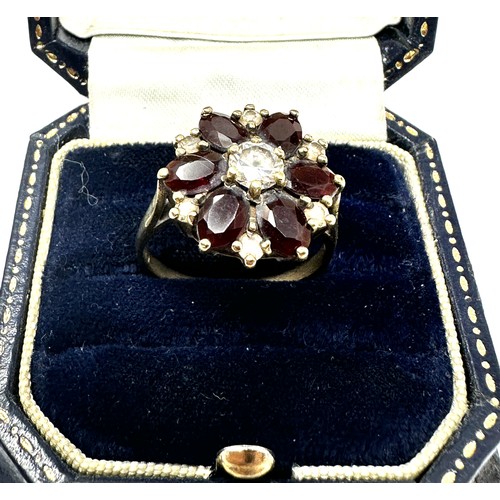 194 - 9ct gold garnet & cubic zirconia dress ring (4.1g)