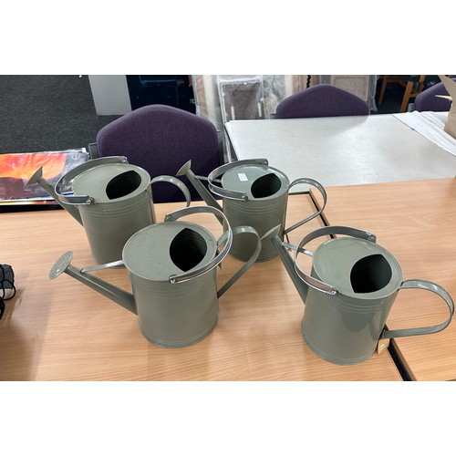 256 - 4 grey watering cans