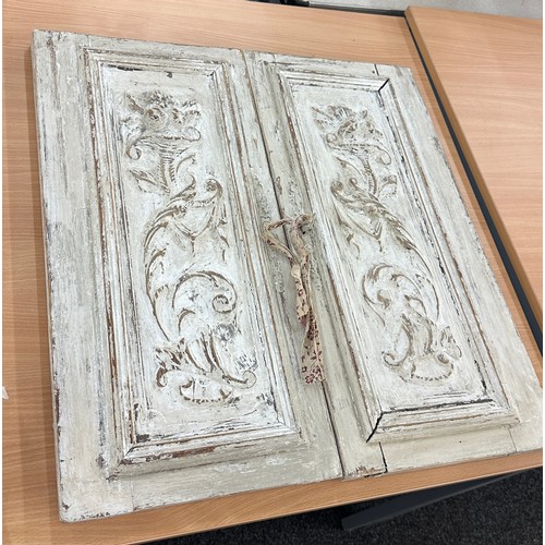 133 - Vintage white washed carved door panels measures approx 26 inches long by 12 inches wide