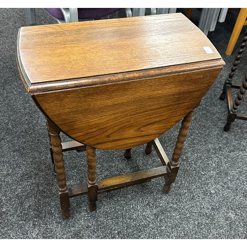 316 - Oak drop leaf table with barley twists legs measures approx leaf down 30 inches tall, 23 wide and 12... 