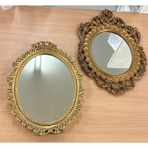 250 - Two gilt framed wall hanging mirrors largest measures approx 21 inches tall by 15 inches wide