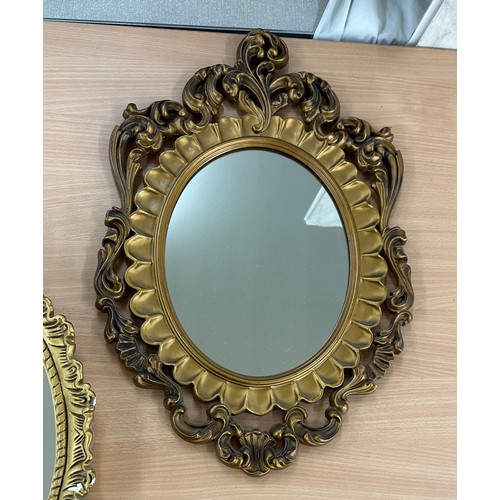 250 - Two gilt framed wall hanging mirrors largest measures approx 21 inches tall by 15 inches wide