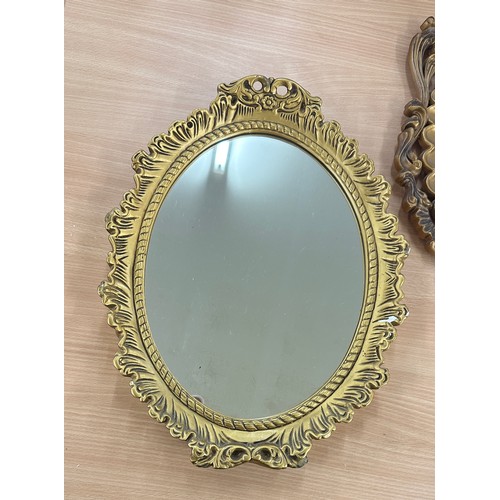 250 - Two gilt framed wall hanging mirrors largest measures approx 21 inches tall by 15 inches wide