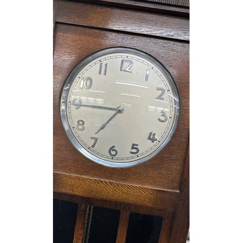 321 - Oak grandmother clock three weights and pendulum measures approx 75 inches tall by 21 inches wide