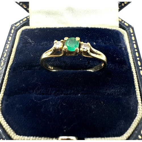 151 - 18ct gold emerald & diamond three stone ring (2.4g)