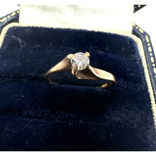 125 - 9ct gold diamond solitaire ring (1.1g)