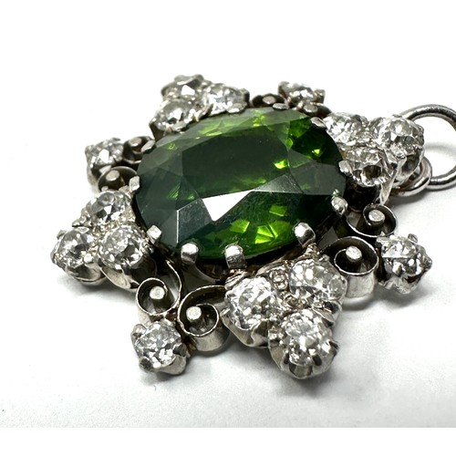 117 - Fine 18ct gold natural green zircon  &  diamond pendant set with large central green Zircon measures... 