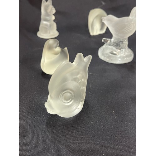 86 - Selection of frosted glass paper weights includes lions, elephants, dogs etc