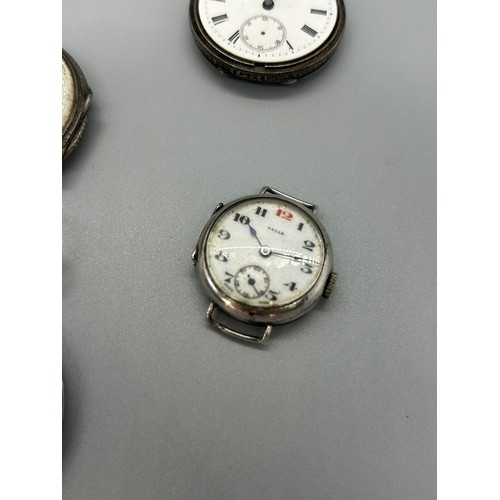 459 - 4 Silver cased pocket/ fob watches and a Dela wrist watch face