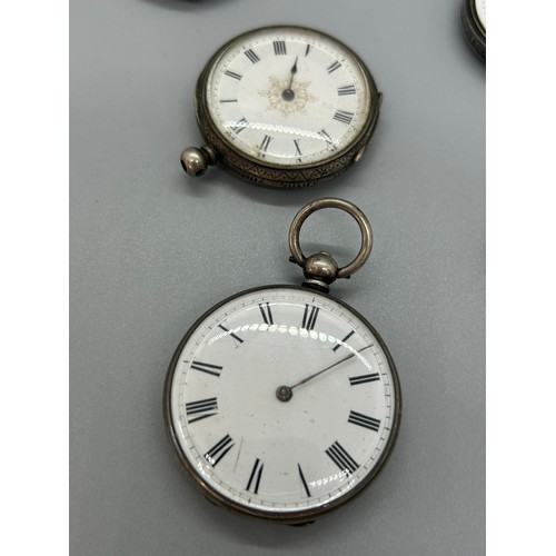 459 - 4 Silver cased pocket/ fob watches and a Dela wrist watch face