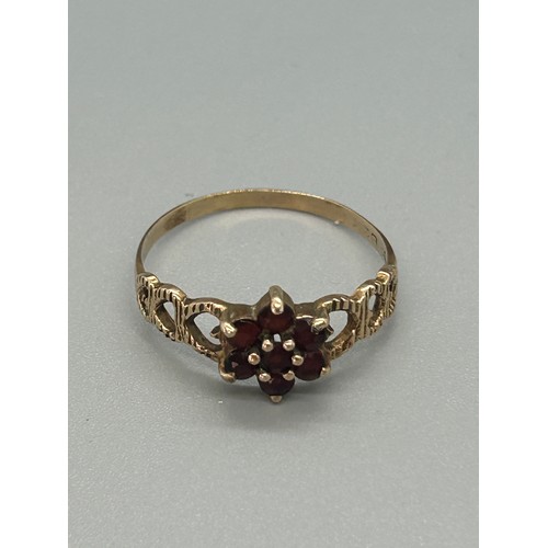 457 - Ladies 9ct gold garnet set dress ring total weight 2grams ring size U