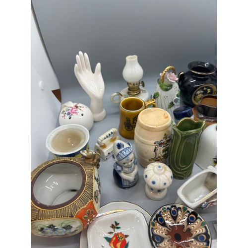 20 - Large selection of assorted pottery includes vases, jugs etc