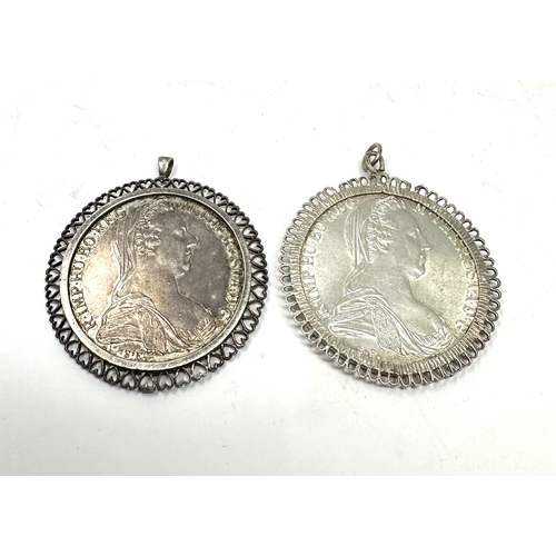 429 - 2 pendant framed M.Theresiad silver coins