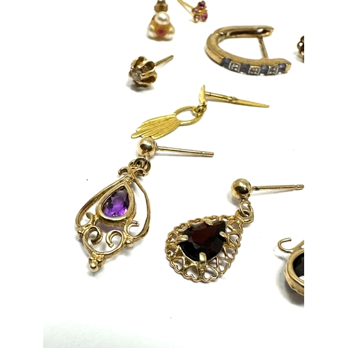 73 - 10 9ct gold gemstone set odd earrings inc dia amethyst garnet etc weight 5.2g