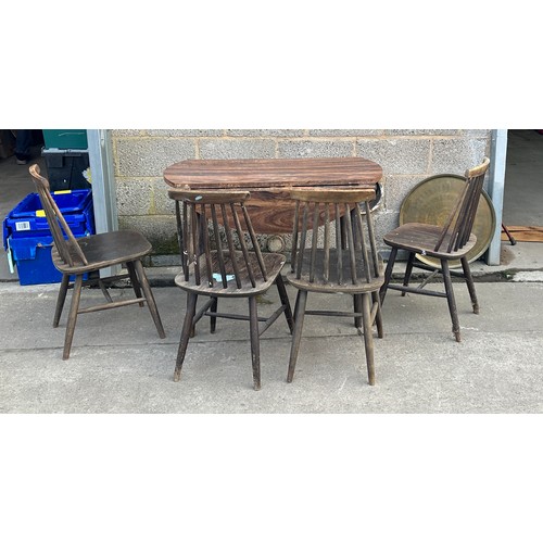 291 - drop leaf table and four chairs