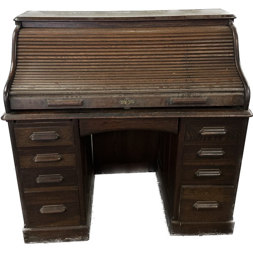 310 - Antique oak twin pedastool roll top desk measures approximately 47 inches tall 48 inches wide 27.5 i... 