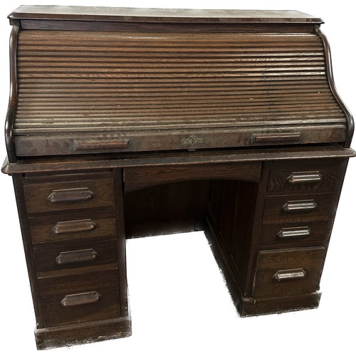 310 - Antique oak twin pedastool roll top desk measures approximately 47 inches tall 48 inches wide 27.5 i... 