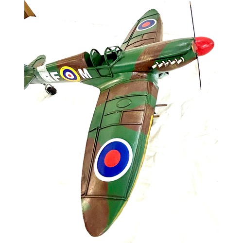 255 - Model tin plate Spitfire, approximate measures 16.5 by Wingspan 19 inches