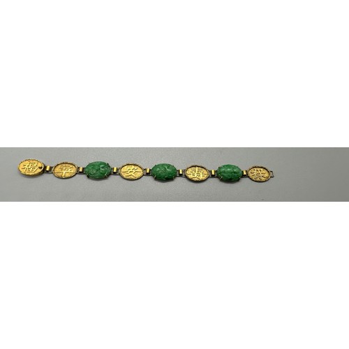 447 - Chinese 18ct gold and jade bracelet