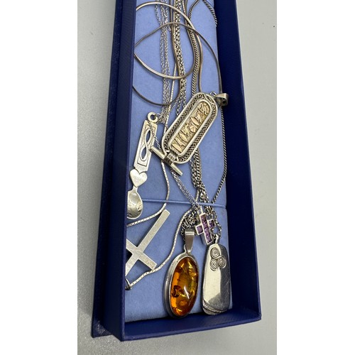 466 - Selection of silver necklaces includes amber set etc