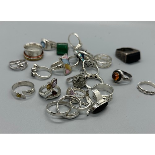 469 - Selection of silver rings includes topaz, enamel, garnet etc