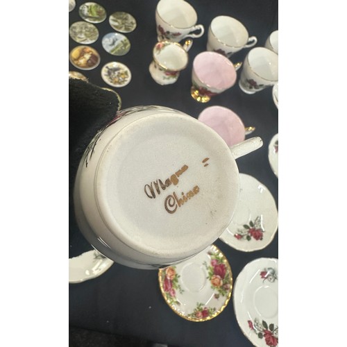 182 - Selection of miniature centenary plates, selection of collectors cups and saucers to include Paragon... 