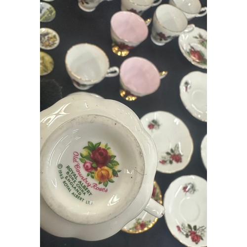 182 - Selection of miniature centenary plates, selection of collectors cups and saucers to include Paragon... 