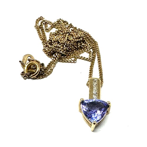 162 - 9ct gold tanzanite & diamond pendant & chain (1.7g)