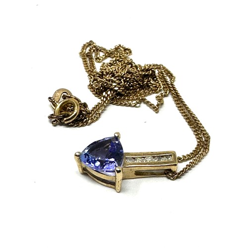 162 - 9ct gold tanzanite & diamond pendant & chain (1.7g)