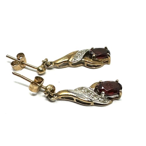 156 - 9ct gold garnet & diamond drop earring (1.5g)