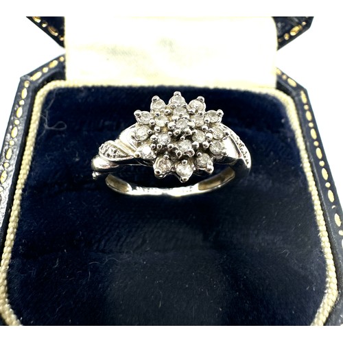 86 - 9ct white gold diamond cluster ring (2.6g)