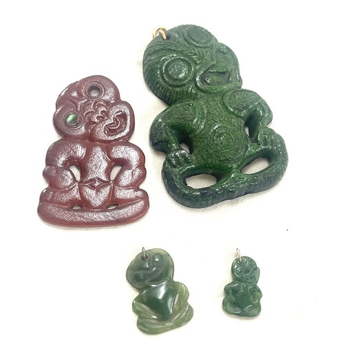 553 - Two vintage Nephrite Jade New Zealand Maori Tikis and 2 others