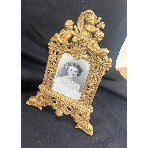 83 - Pair of very heavy french photo frames, overall height 14 inches