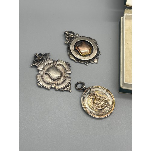 525 - Selection of four vintage silver fobs