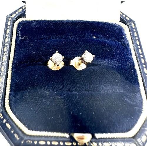 160 - 10ct gold diamond stud earrings (0.7g)