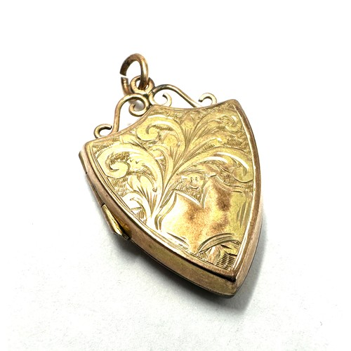 102 - 9ct front & back antique patterned locket (3.9g)