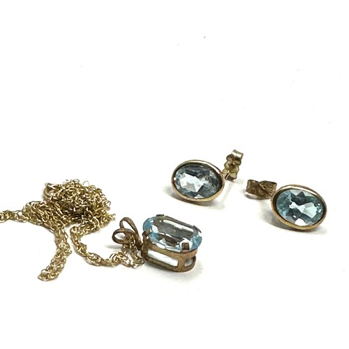 106 - 2x 9ct gold blue topaz earrings & necklace set (1.8g)