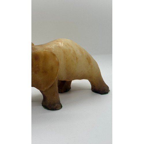 556 - Onyx elephant measures approx 6 inches tall by 8 inches wide