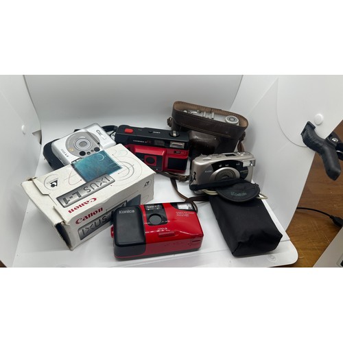 77 - Selection of vintage and later cameras to include Canon etc, all untested