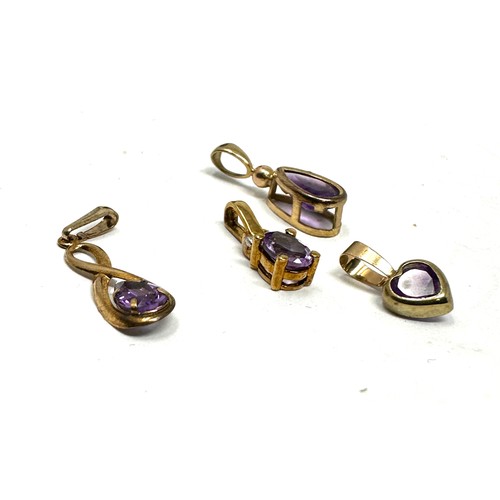 107 - 4x 9ct gold amethyst pendants (1.1g)