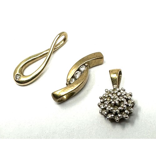 105 - 3x 9ct gold diamond pendants (1.7g)