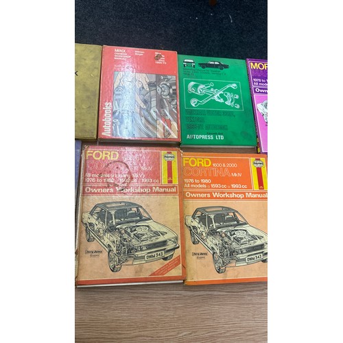 234 - Selection of vintage car manuals to include Haynes, Hillman singer etc