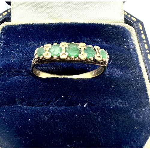 119 - 9ct gold emerald five stone ring (1.6g)