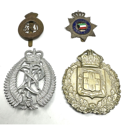 404 - 4 police cap helmet badges inc kuwait-bahamas jamaica -newzealand